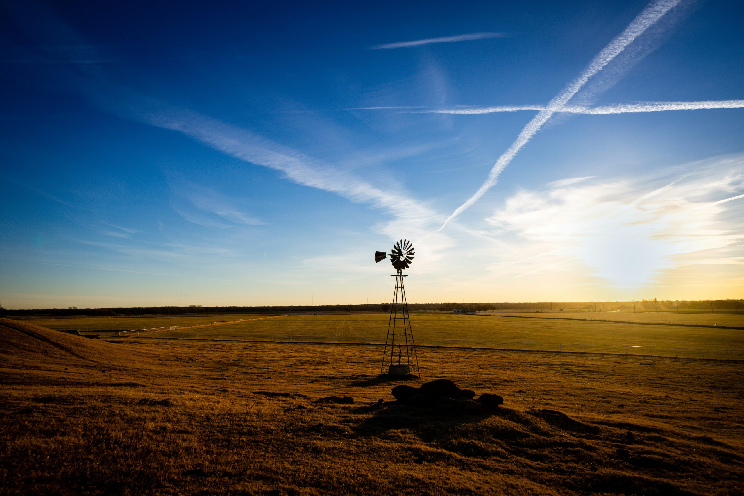 Rural windmill in an open field near Yukon, Oklahoma